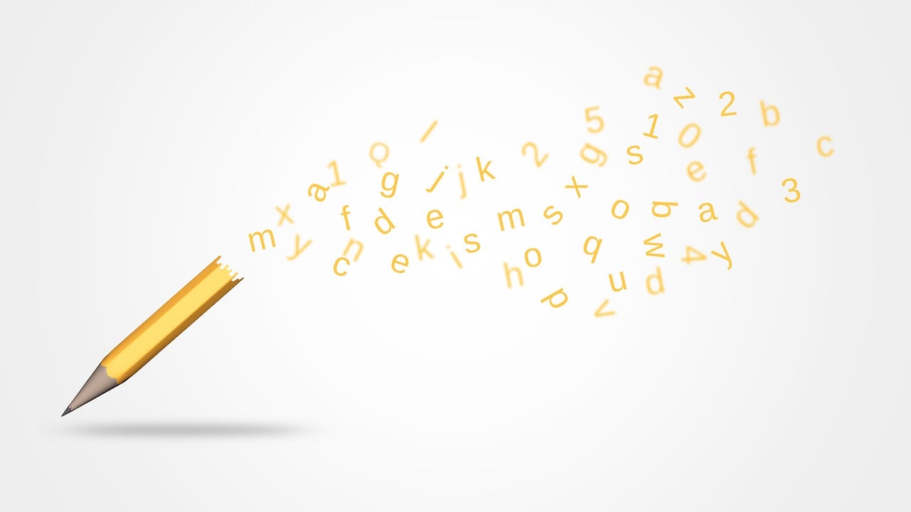 Bleistift und Buchstaben